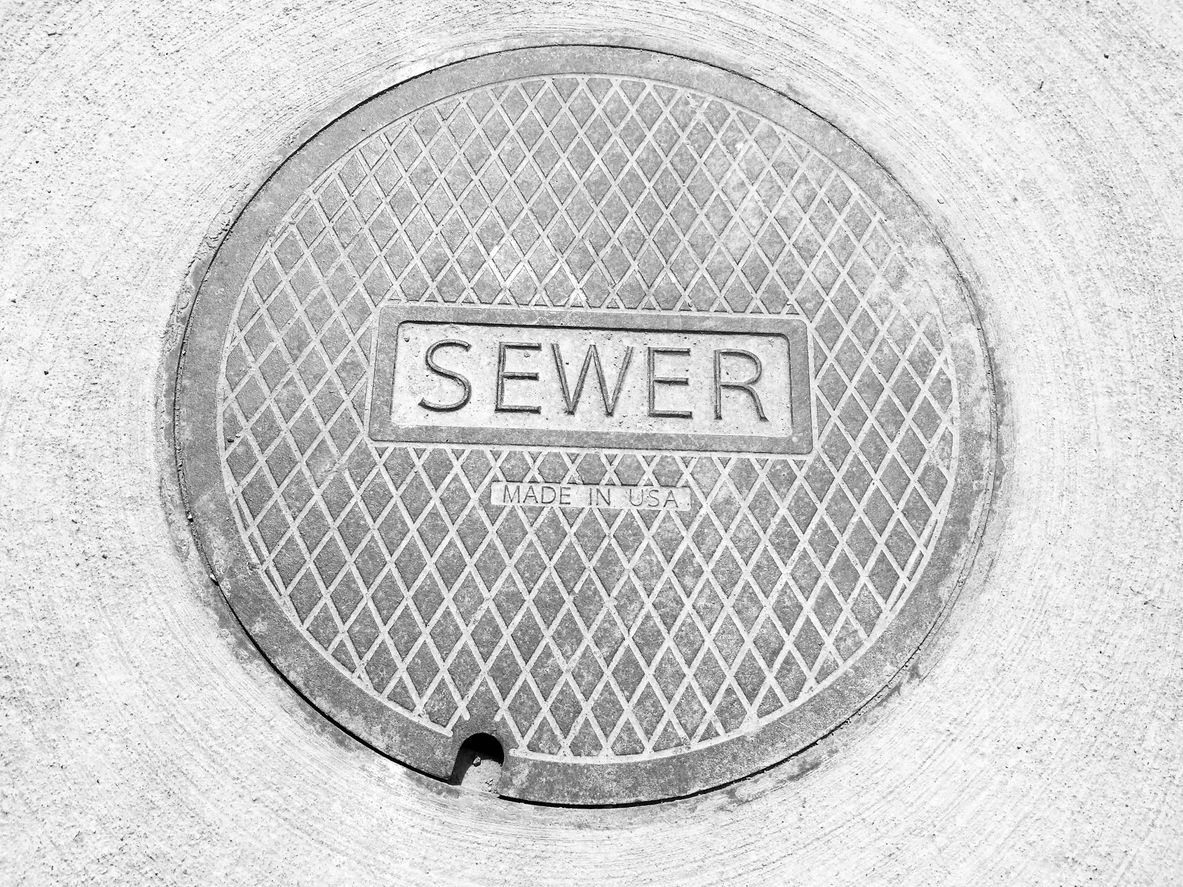 Public sewer cover — Build Over Agreement required for extensions near sewers — Hampshire Build